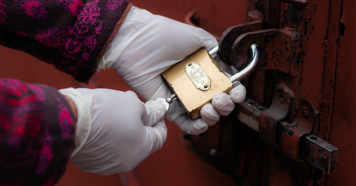 locksmith unlocking front door — Garden City Locksmith Services